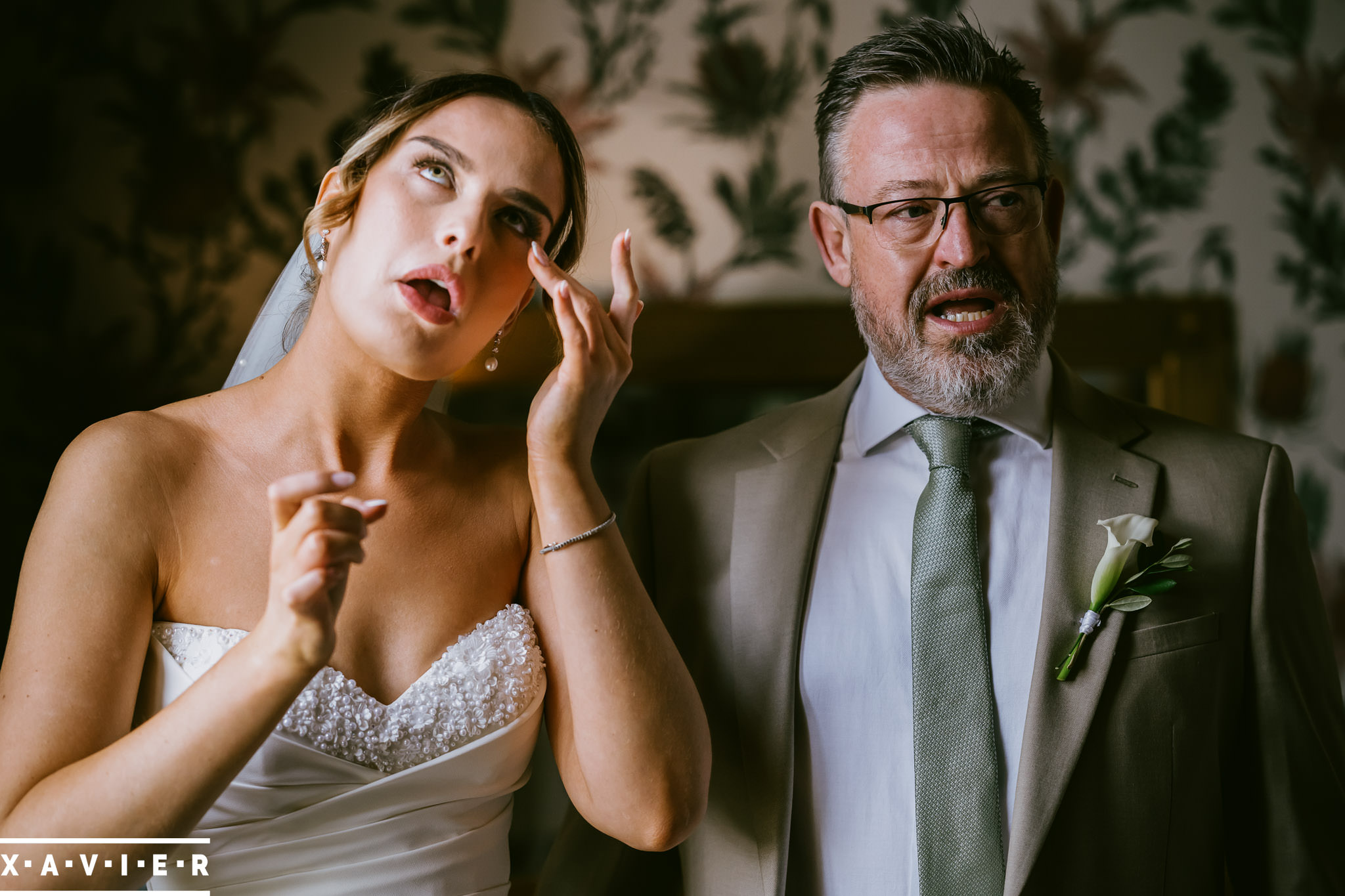 bride and father crying after bridal reveal at swinton park wedding venue ripon