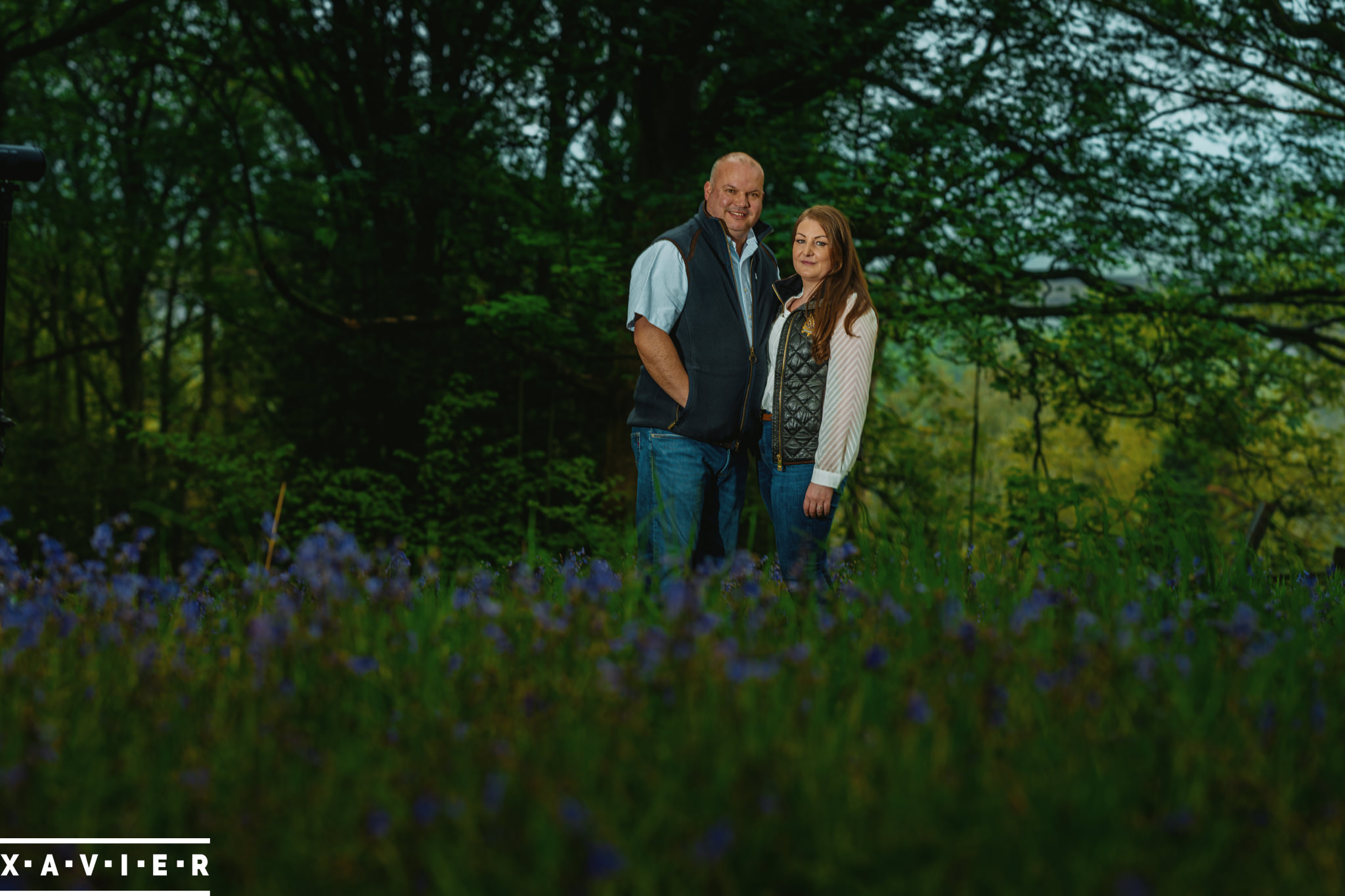 couple surrounded by bluebells during connection engagement photography