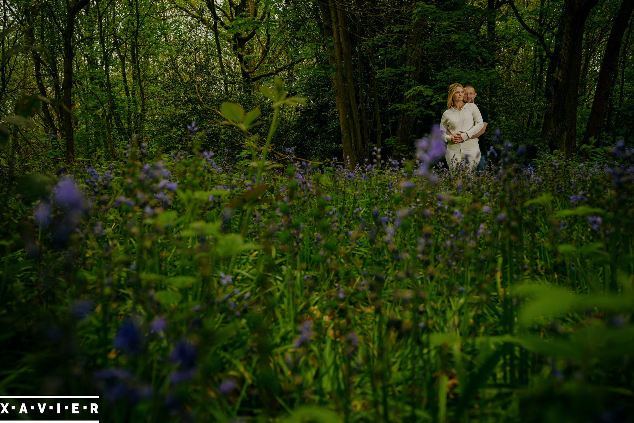 engagement connection photos in woodland with bluebells