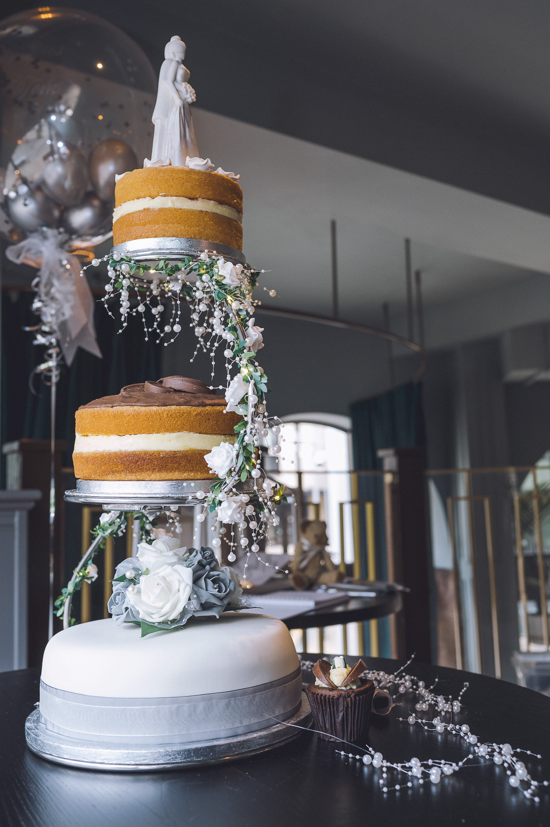 Image shows the three tiers of the wedding cake