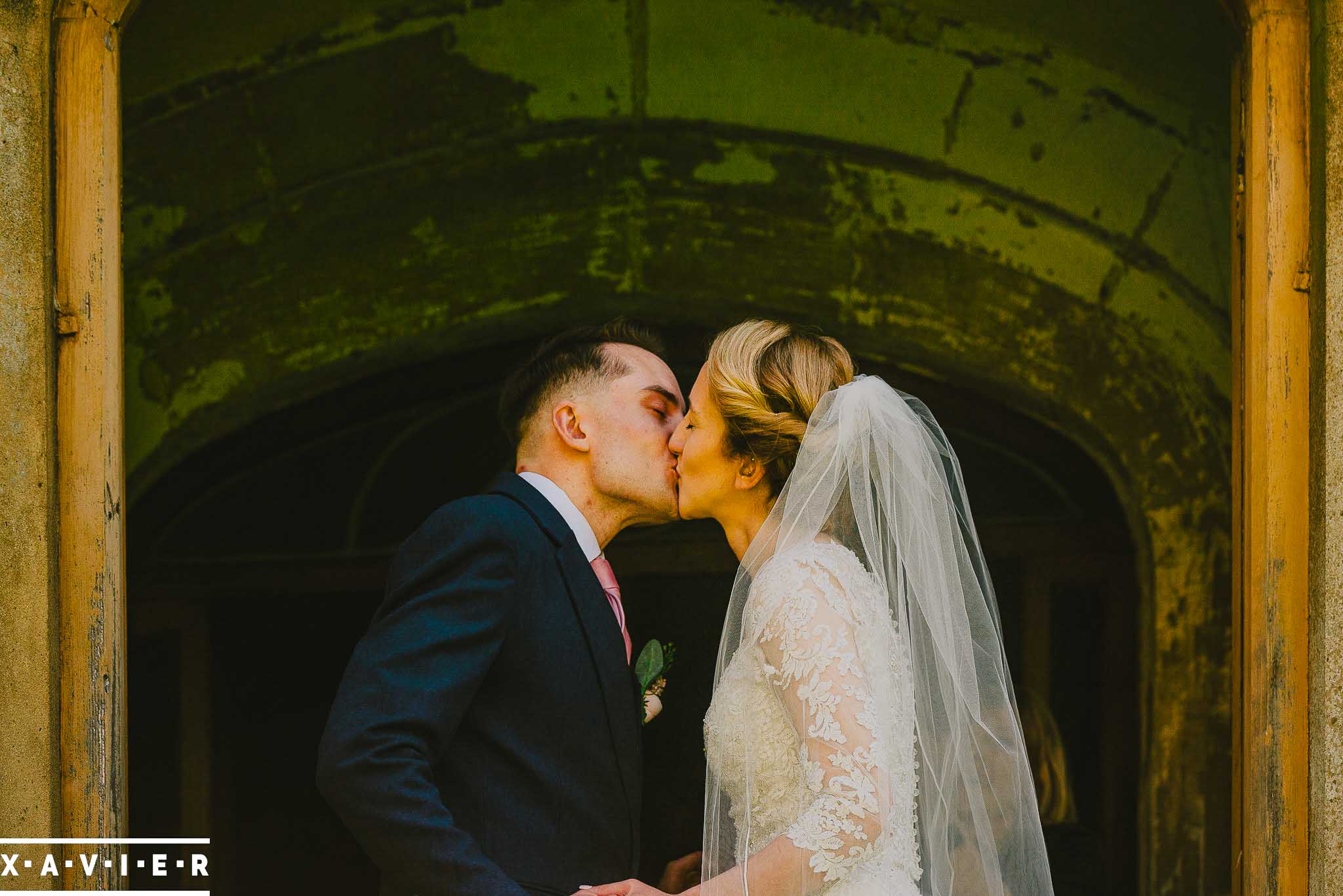 bride and grooms first kiss