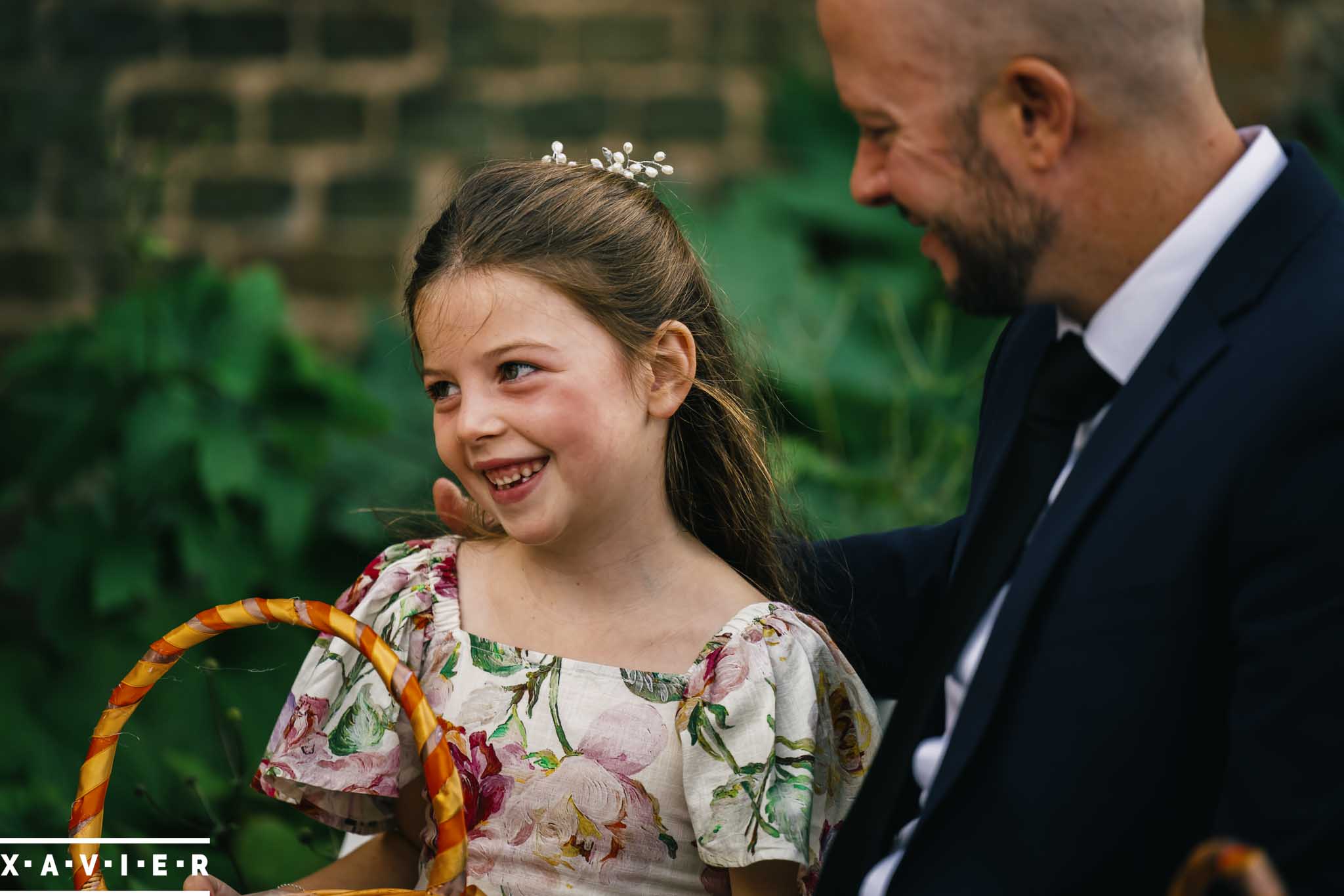 bride places the grooms ring on his finger