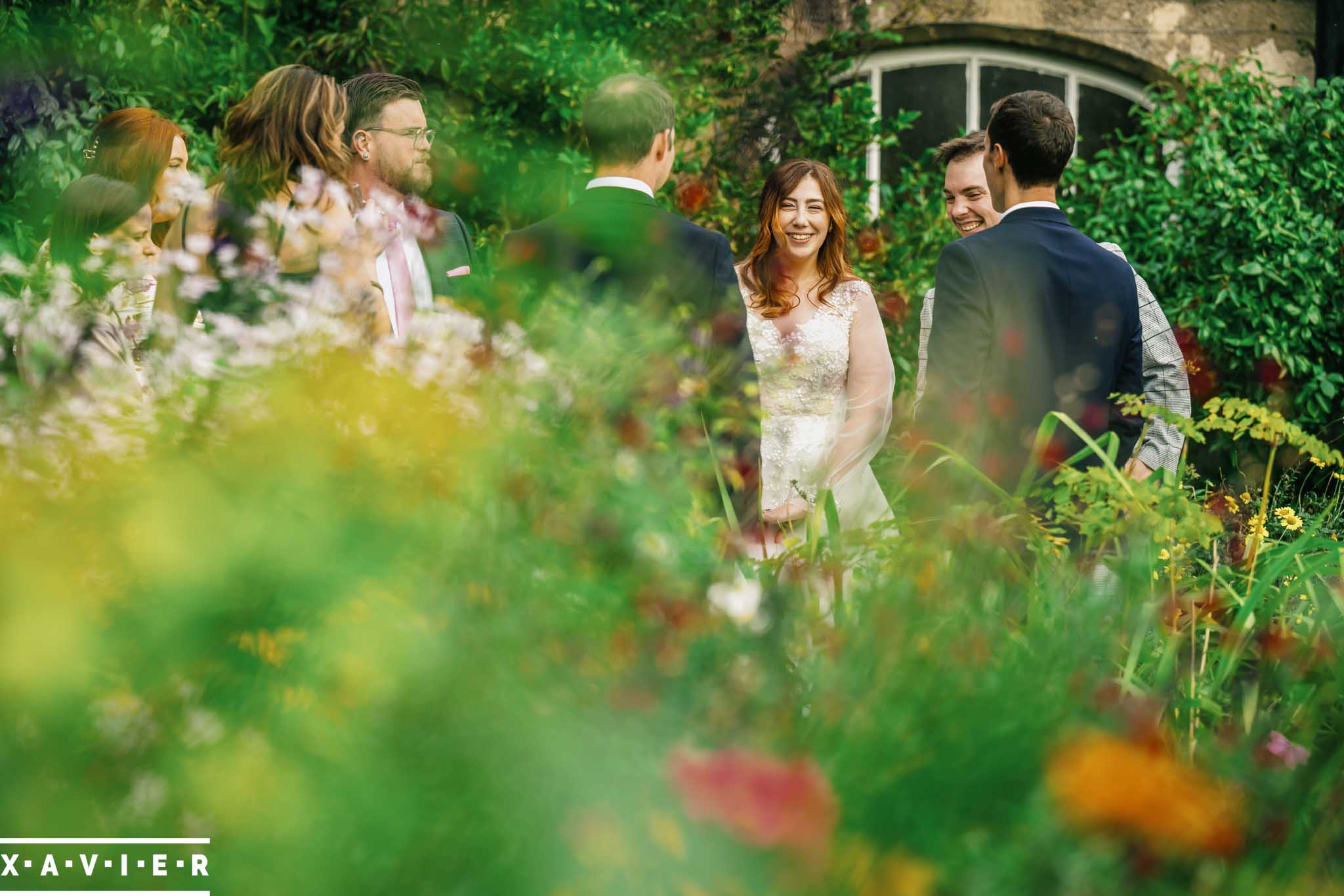 guests chatting with the bride