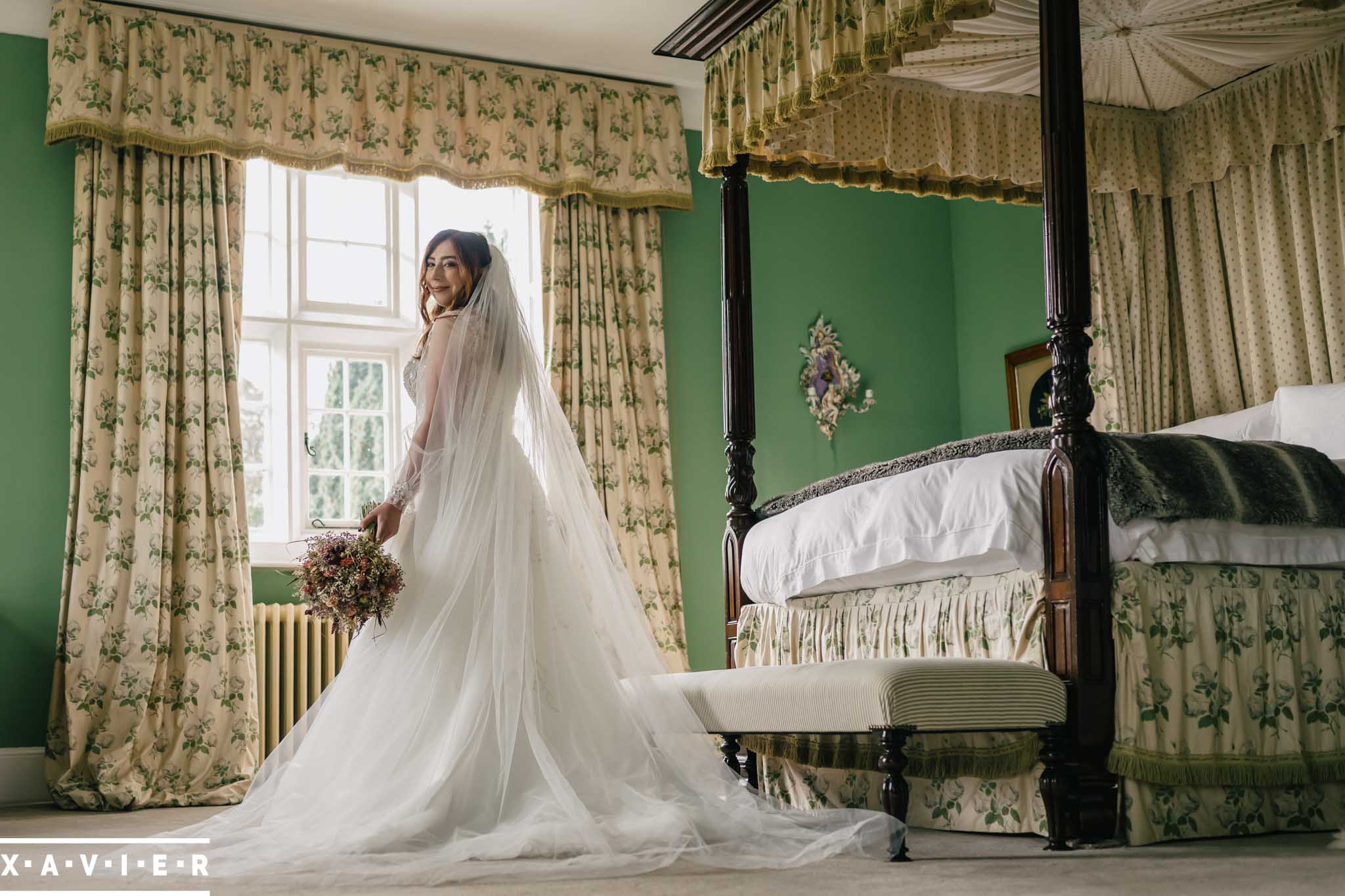 bride holds her flowers in the getting ready room