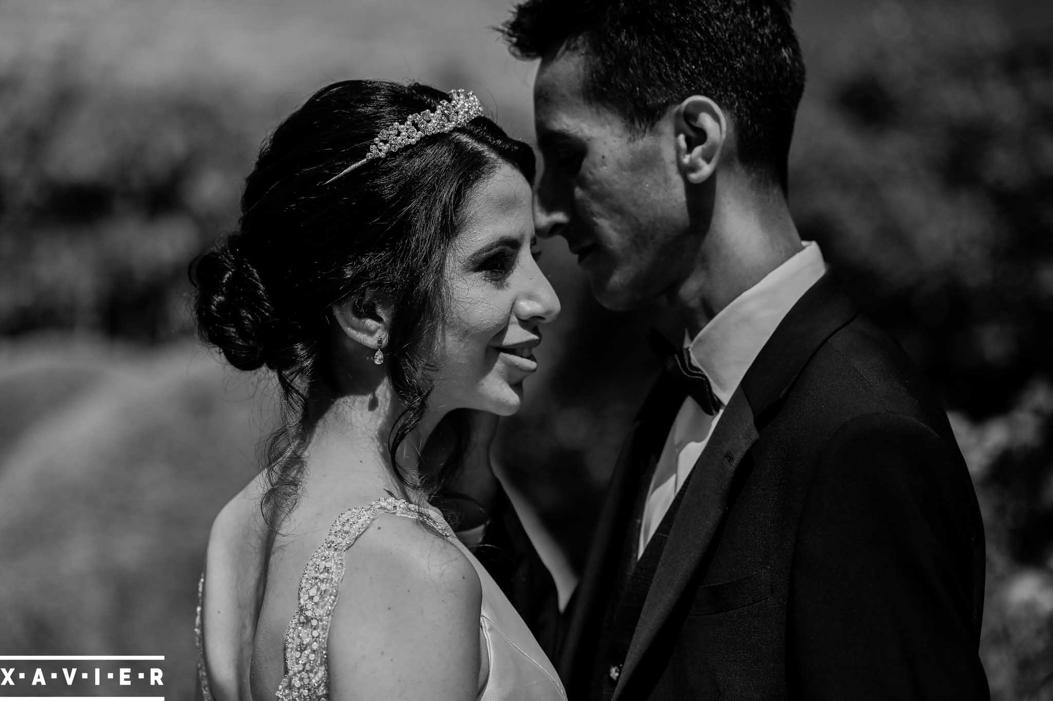 bride and groom stand together