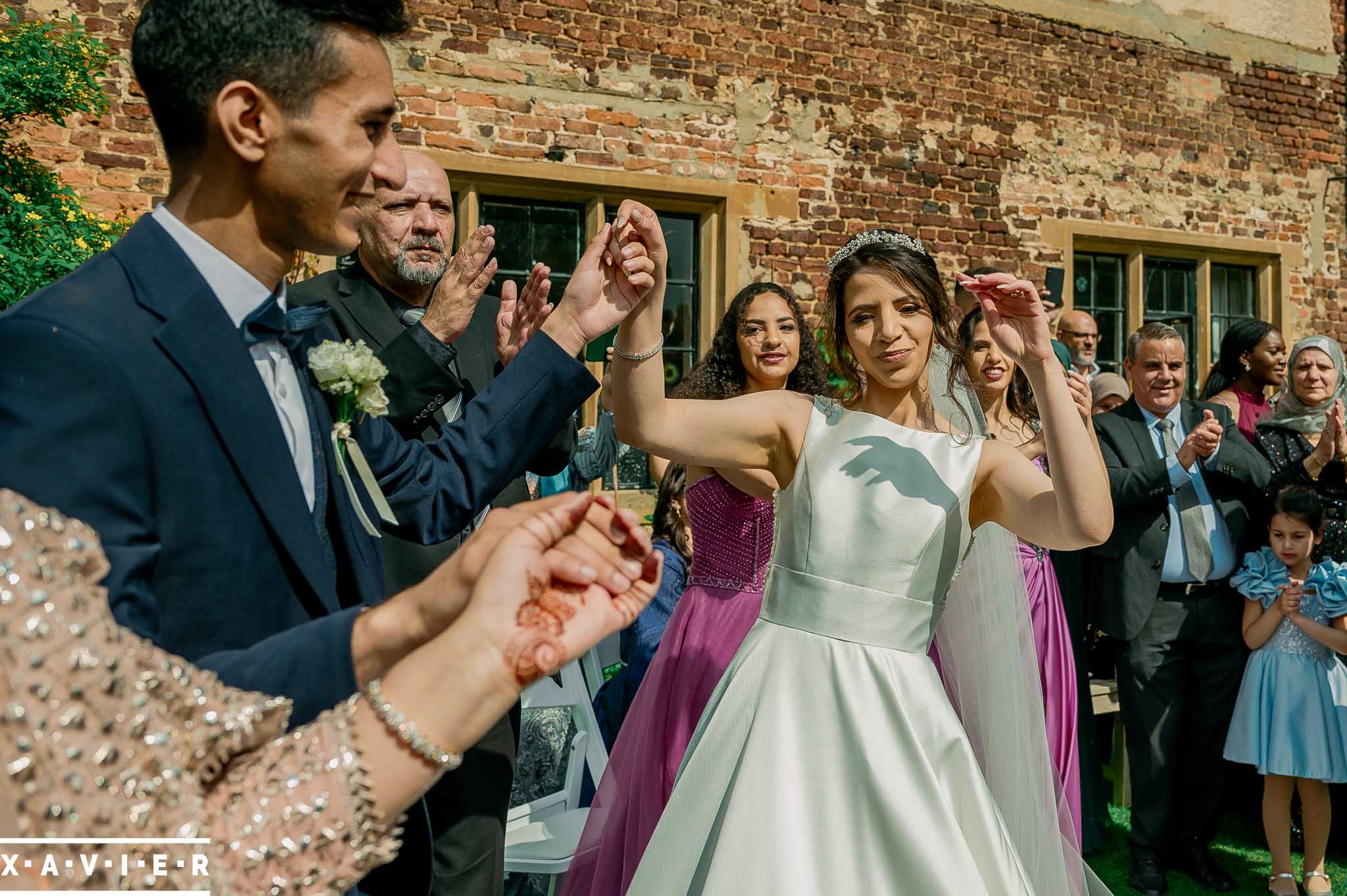 bride dances with guest