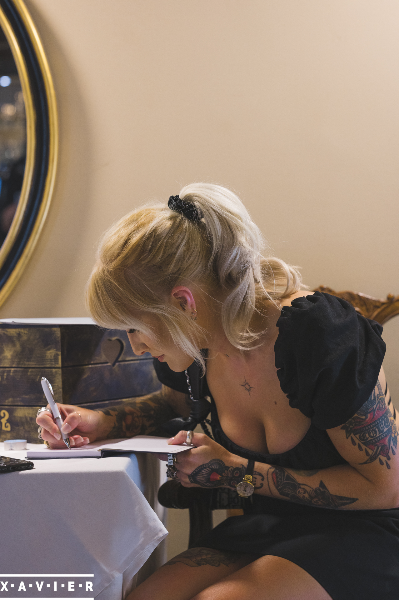 guest signing the wedding book
