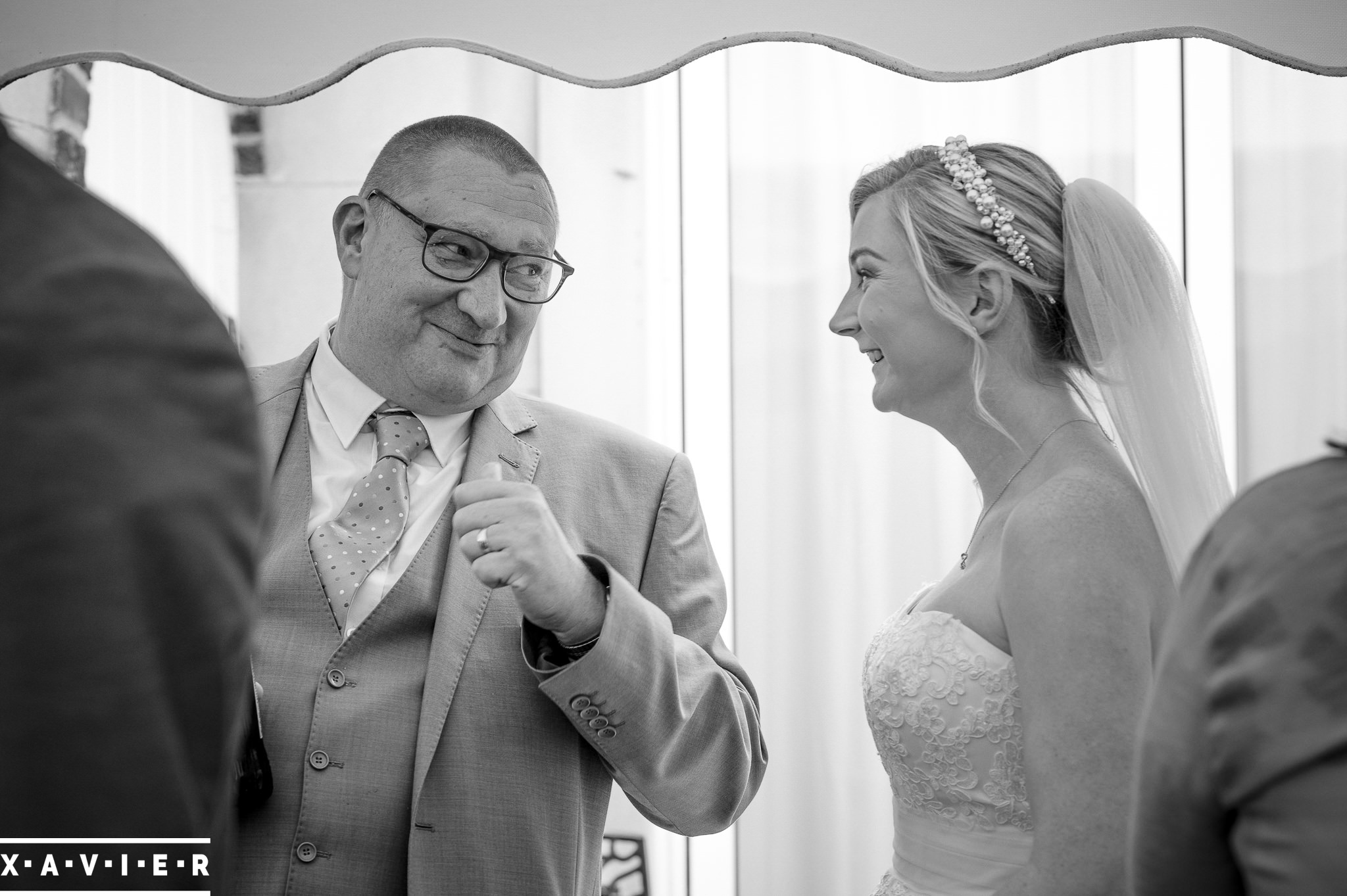 bride talks to a guest