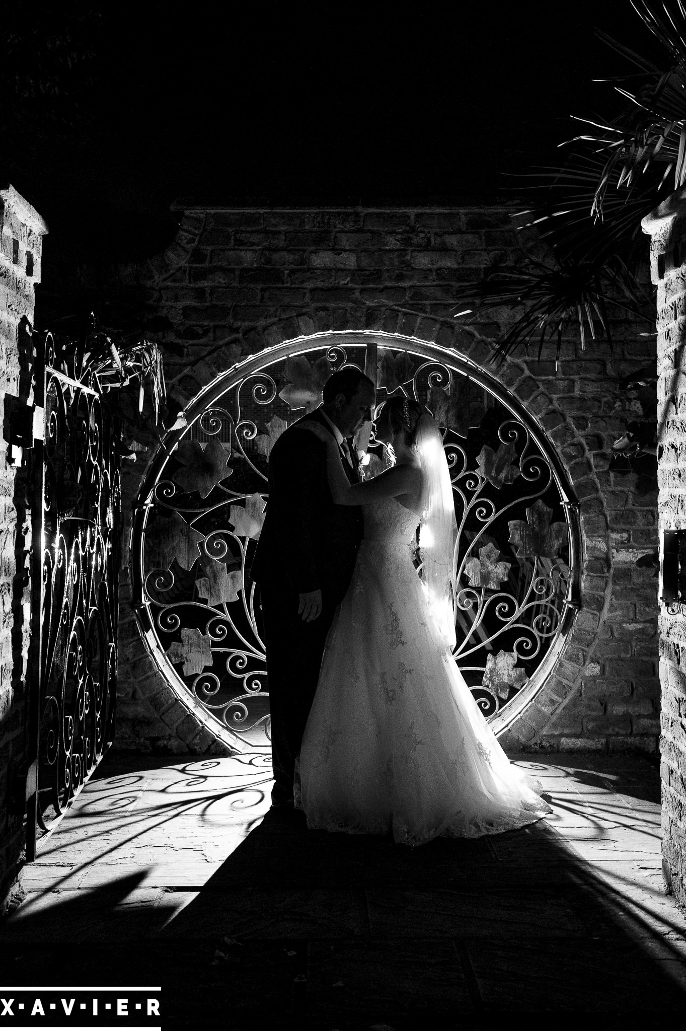 bride and groom outside in the dark