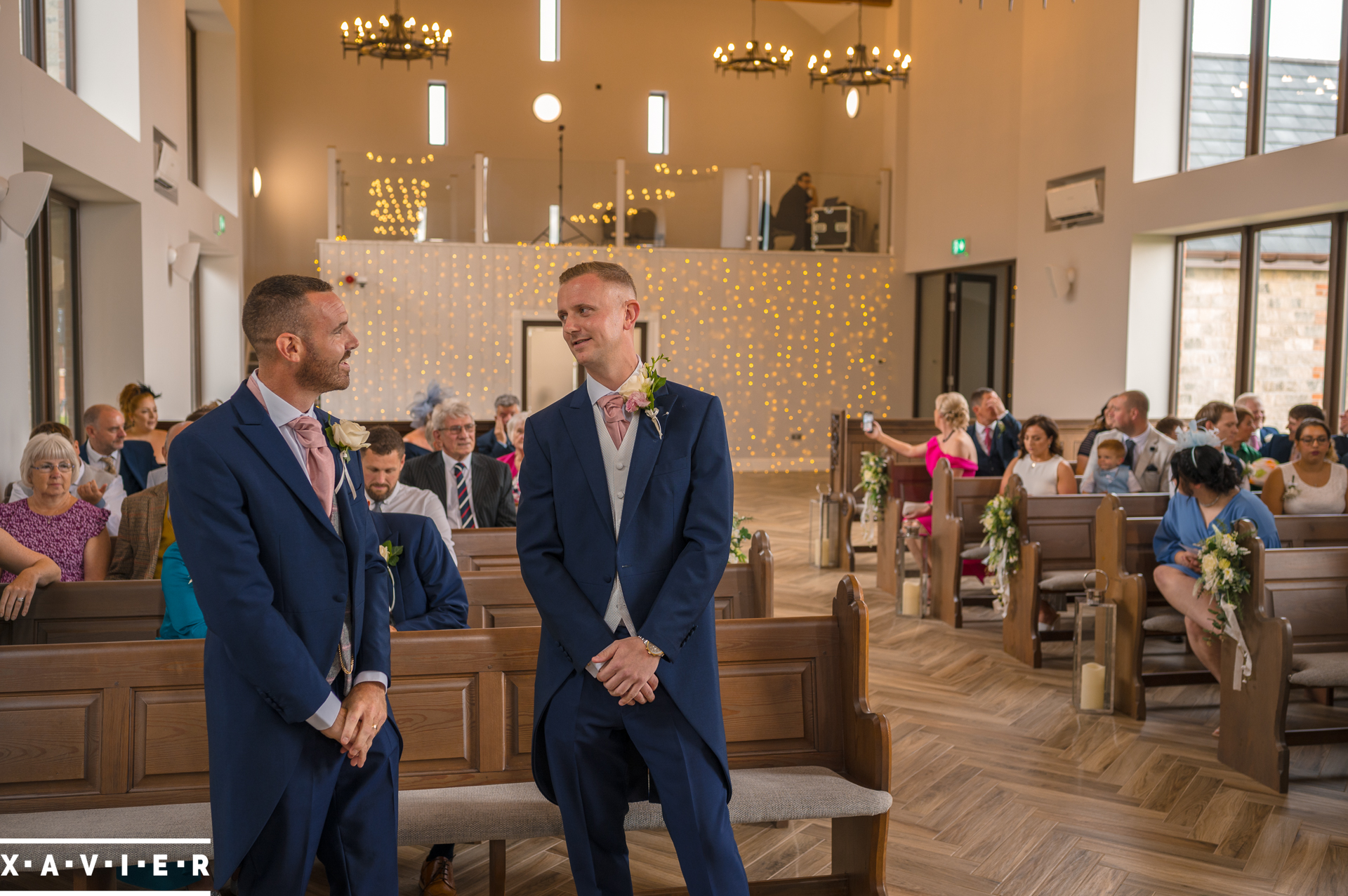 groom and Bestman stand in the ceremony room