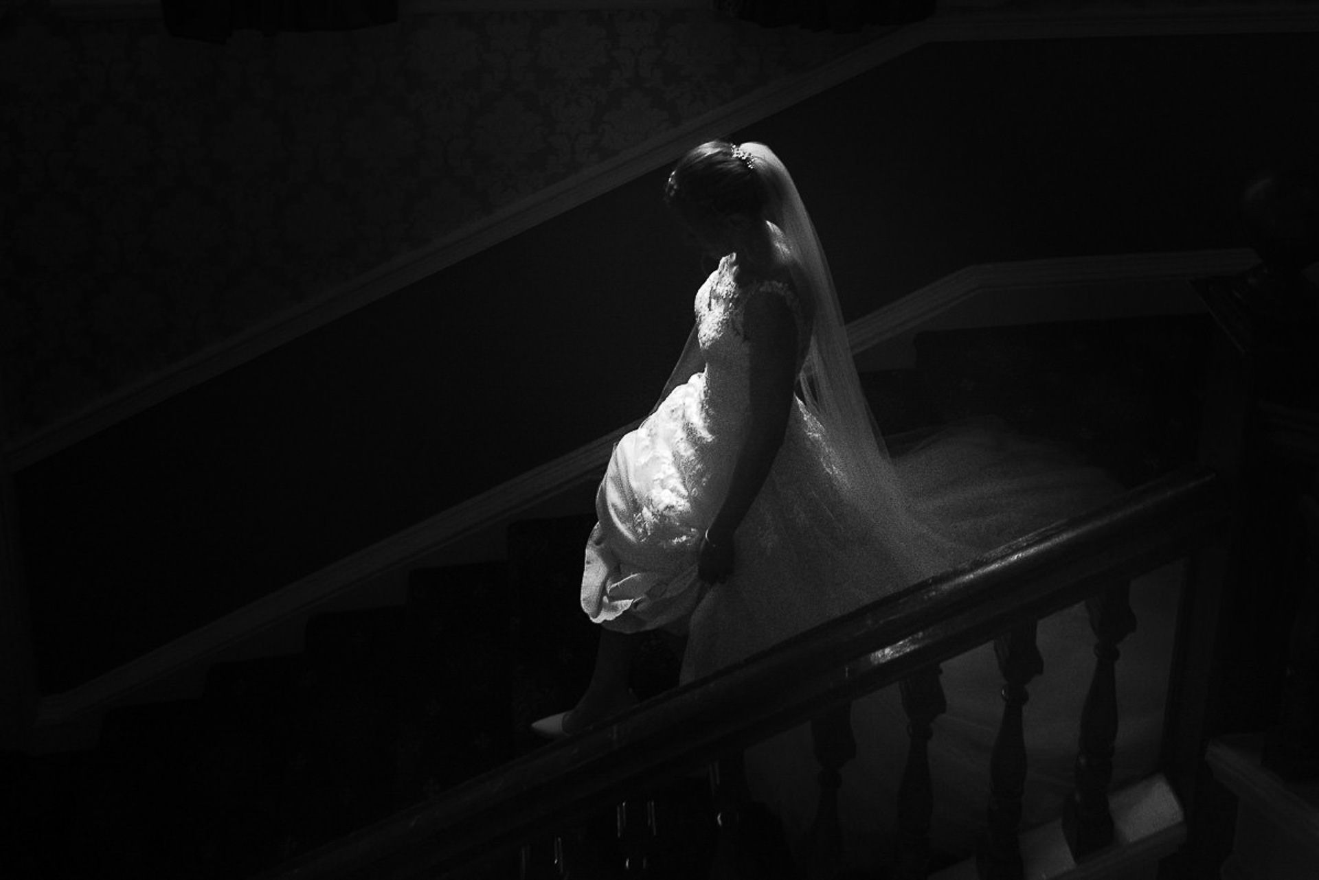 bride walks down the stairs
