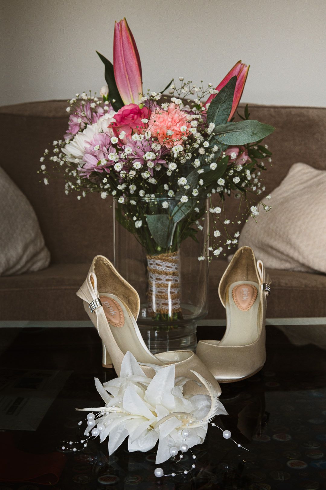 brides shoes and flowers