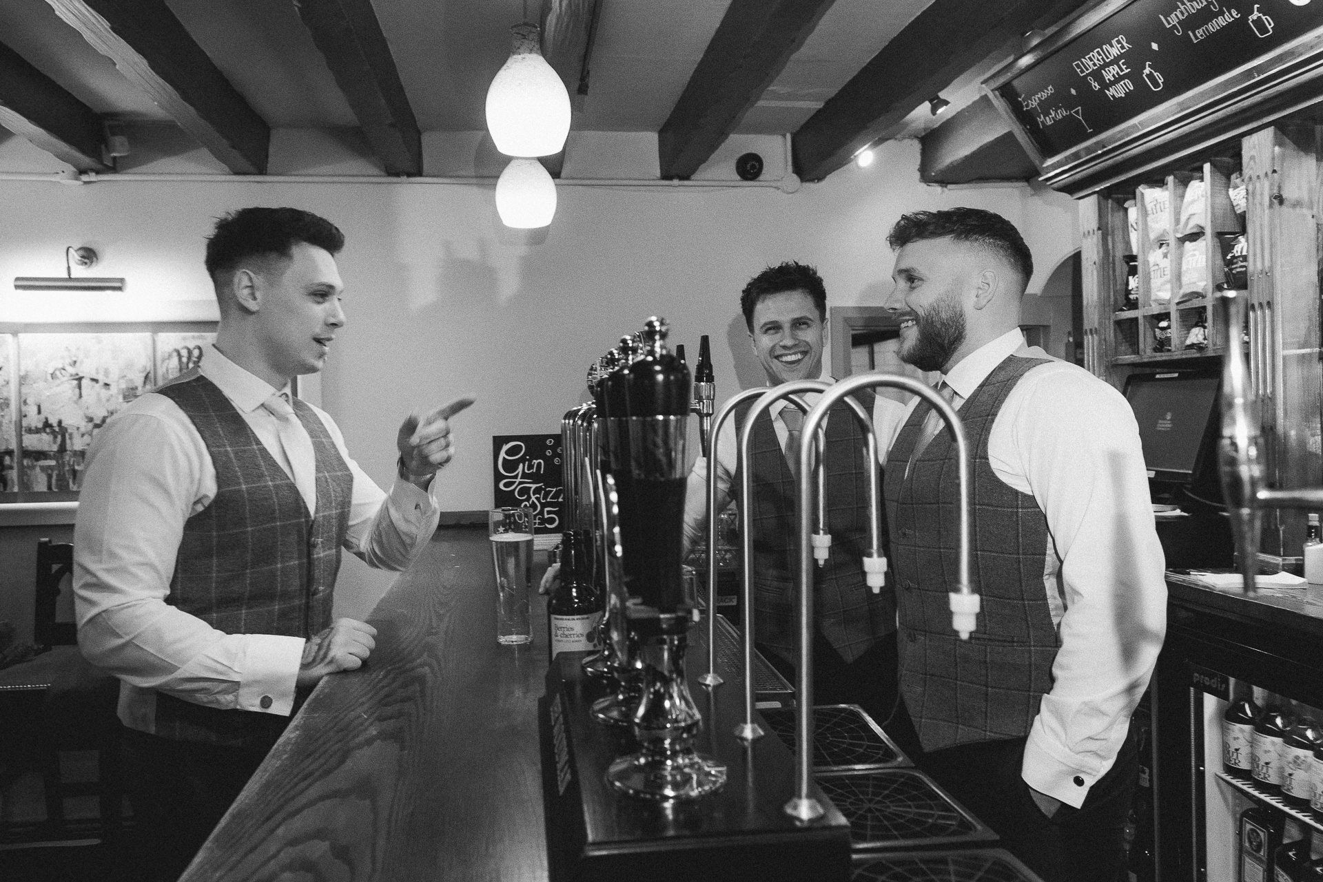 groom orders a pint from the groomsmen