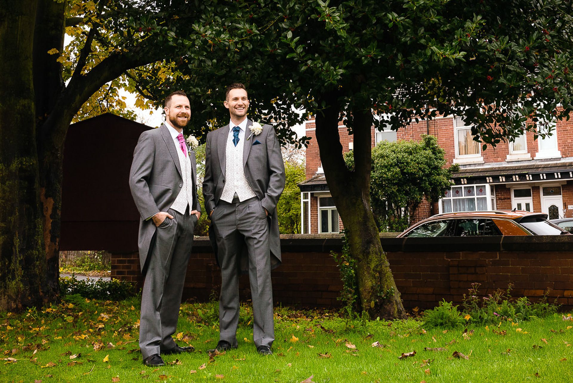 groom and bestman wait outside the church