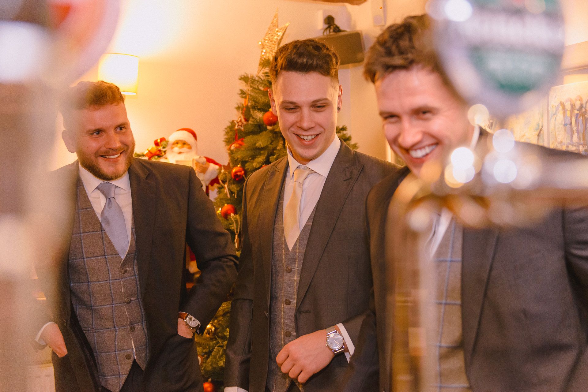 groom laughs with his best men